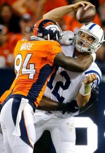 DeMarcus Ware sacks Andrew Luck in Week 1 (AP)