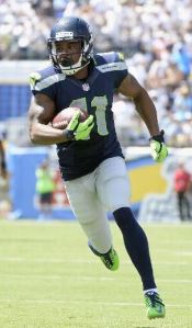 Percy Harvin runs for a touchdown in San Diego on Sept. 14 (AP)