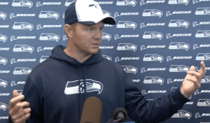 Darrell Bevell speaks to reporters Wednesday