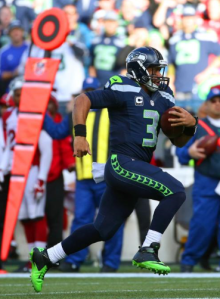 Russell Wilson dashes for an apparent TD vs. Arizona, although the score was nullified by a holding penalty (Seahawks.com)