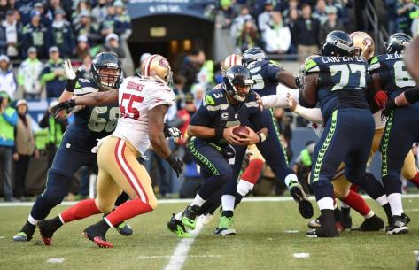 The Seahawks' offensive line struggles to protect Russell Wilson against the 49ers in Week 15 (Seahawks.com)